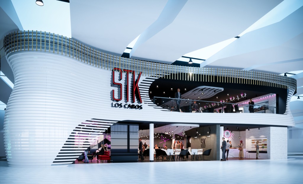 Exterior view of a architecturally striking restaurant with a white, curving facade. Large red letters reading 
